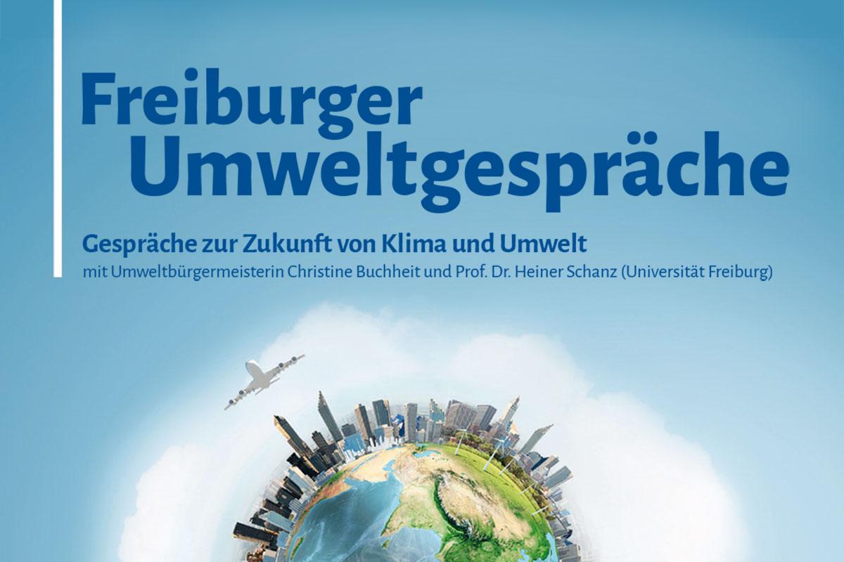 Blaue Grafik einer bebauten Weltkugel mit Text: Freiburger Umweltgespräche