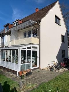 Die Rückseite des Gebäudes noch mit Wintergarten und Loggia.