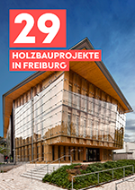 Titelbild des Holzbauführers. Darauf ein Gebäude aus Holz und Text: "29 Holzbauprojekte in Freiburg"
