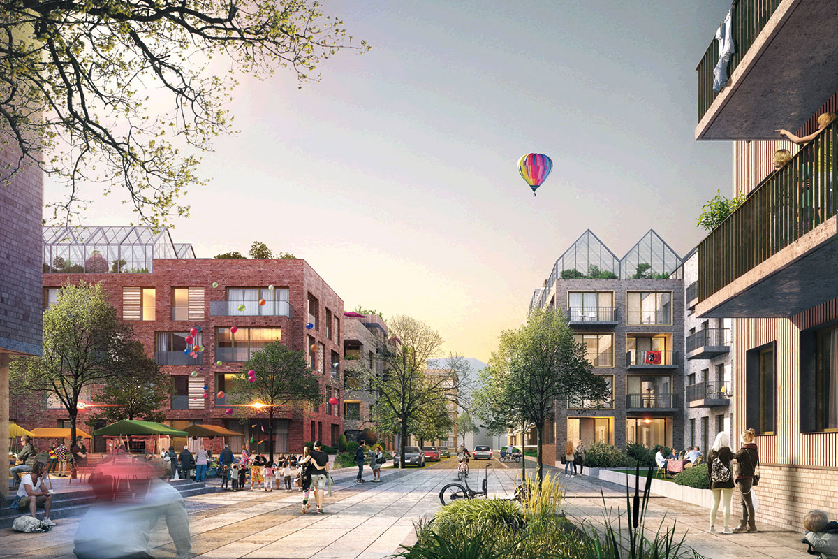 Blick in eine Wohnstraße mit mehrstöckigen Häusern und Heißluftballon am Himmel