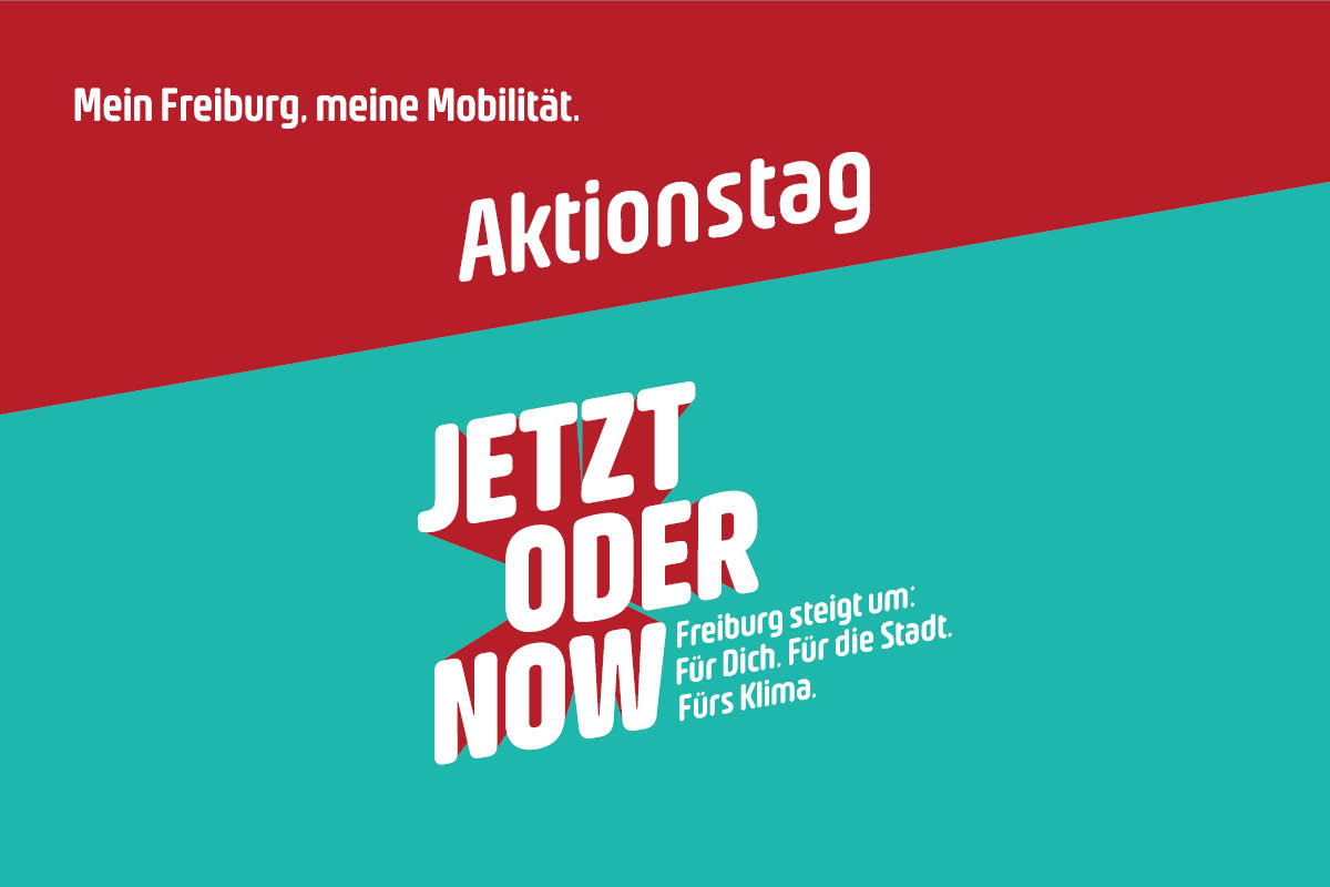 Großer Schriftzug 'Aktionstag' - darunter Schriftzug 'JETZT ODER NOW' - Kleiner Schriftzug 'Freiburg steigt um: Für Dich. Für die Stadt. Fürs Klima.'